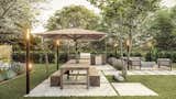 Outdoor, Back Yard, Garden, Gardens, Hanging Lighting, Grass, Trees, Hardscapes, Walkways, Flowers, and Shrubs Canopy-shaded garden dining view  Photo 2 of 5 in Woodland Landscape Design by Homely Design