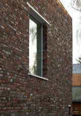 Windows, Wood, and Picture Window Type detail of the facade west  Photo 3 of 27 in Haus K18 by Till Kurz
