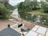 Outdoor, Landscape Lighting, Large Patio, Porch, Deck, Wood Fences, Wall, Large Pools, Tubs, Shower, Trees, and Slope Bluffs Club on the Guadalupe   Photo 2 of 2 in Tree Bar at Bluffs on the Guadalupe by Will Korioth