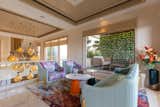 The residence is designed around a central courtyard that serves as an external bonding between the families.