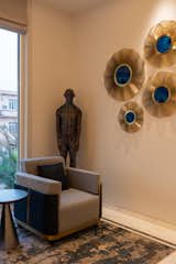 Stepping indoors, one is transported to a contemporary world with state-of-the-art fixtures with accents of classical elements. 
