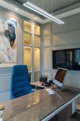 The third floor includes the director’s cabin and private meeting rooms. All these spaces follow a colour palette that combines grey and blue tones. The workplace focuses on tasks relating to water, thus it makes sense that these colours represent water. The colour scheme is meant to convey professionalism, serenity, and a link to the water motif. Further, the fourth and fifth floors are designated for private bedroom spaces along with a penthouse for party areas. These cater to the various needs of the occupants. 

