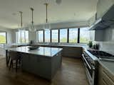 Kitchen with a window wall as the backsplash 