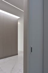 Bedroom, Ceiling Lighting, Wardrobe, and Porcelain Tile Floor  Photo 15 of 20 in Warm White by WOW estudio