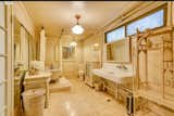 The Parsonage downstairs apartment’s bathroom with claw foot tub