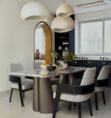 A modern dining area that combines sophisticated design with inviting warmth!