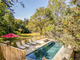 The gunite pool is filled with saltwater.