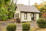 The property's orchard is home to plum trees and a guesthouse.