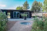 Per the agent, the home takes inspiration from Eichler’s California homes, with its secluded outdoor areas, silhouette, and siding.