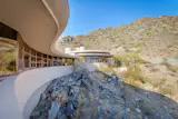 Views of Palm Canyon and the city of Pheonix unfold outside the home.