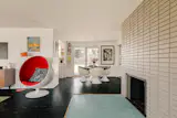 The teal terrazzo tile is original to the home.
