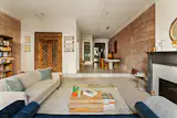 The living room is sunken one step, offsetting it from the rest of the home.