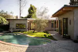 In an effort to preserve the material and patina, much of the concrete throughout the property was repurposed from the original site.