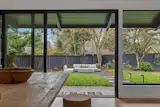 In Portland, a Matte-Black Midcentury With Minimalist Interiors Seeks $1.1M - Photo 10 of 13 -
