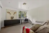 In Portland, a Matte-Black Midcentury With Minimalist Interiors Seeks $1.1M - Photo 7 of 13 -