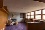 In the Usonian tradition, the home is low slung, emphasiziong a connection to nature and simple materials.