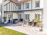 Topped With a Colorful Shingled Roof, an Ornate French Villa Seeks $2.5M - Photo 11 of 12 - 