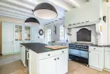 Topped With a Colorful Shingled Roof, an Ornate French Villa Seeks $2.5M - Photo 5 of 12 - 