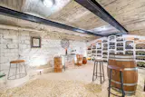 The basement holds a large wine cellar.