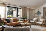 The living space with its mix of modern, traditional and midcentury elements is warm and inviting. 