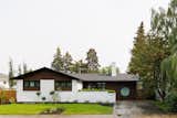 The exterior of the this 50's bungalow was updated with painting the brick, modern wood slat details and a feature circle window. Keeping the heritage of this bungalow was important, we just wanted to update it.