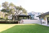 Rear facade of transitional home built by Austin Mod Homes, featuring RAM Windows & Doors. 