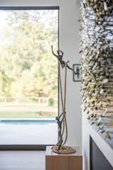 Modern art is illuminated in this airy space created by large RAM picture windows.