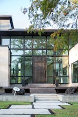 A modern Houston home is rebuilt after Hurricane Harvey and is covered in RAM picture windows.