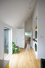 RAM large floor to ceiling picture window allows lots of natural light into this historical Houston home upstairs living and laundry space.