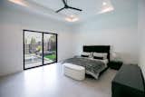 RAM aluminum sliding door elevates the master bedroom and opens space up to beautiful outdoor views.
