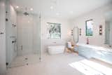 RAM picture windows give access to gorgeous views from this master bath with walk-in shower and large bath.