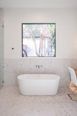 RAM picture windows give access to gorgeous views from this master bath with walk-in shower and large bath.
