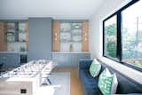 RAM casement windows brighten this game room with natural light.