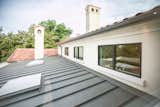 RAM picture windows bring natural light into this Spanish style home in Highland Park, Dallas.