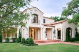 This Spanish Mission style home in Highland Park, Dallas, features RAM picture and specialty windows to welcome its guests into its airy and open space.