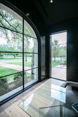 RAM picture and specialty windows create a gorgeous view from this home office area.