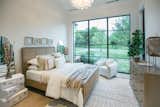 RAM picture windows illuminate this cozy bedroom in Highland Park, Dallas.