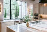 RAM picture windows illuminate this gorgeous kitchen island in Highland Park, Dallas.