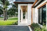 RAM picture window with aluminum frame adds a warm yet modern touch to this traditional style remodeled Houston area home.
