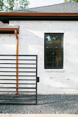With traditional grids, this RAM casement window with aluminum frame adds a warm yet modern touch to this traditional style remodeled Houston area home.