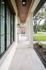 RAM picture windows with aluminum frames add a modern touch to this traditional style remodeled Houston area home.
