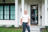 Houston area remodeler, Drew Yoder, stands in front of his remodeled home which features RAM windows.
