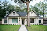RAM picture windows with aluminum frames add a modern touch to this traditional style remodeled Houston area home.