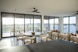 Natural light streams into this living space from RAM picture windows and sliding door.