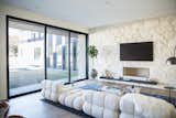 RAM sliding door allows for maximum natural light in this living room while allowing for easy access to the outdoors and cool breezes.