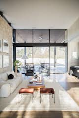 RAM picture windows create a floor to ceiling wall of light in this Austin-area home.