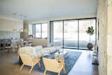 RAM sliding window and door allow for maximum natural light in this open-concept space while allowing for easy access to the outdoors and cool breezes.
