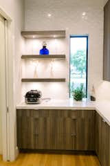 RAM picture windows allow for natural light and gorgeous views from this modern Dallas area kitchen.