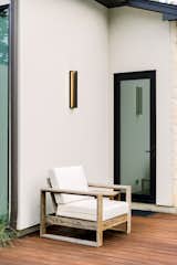 RAM swing door completes this modern outdoor courtyard with easy access to the home.