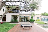 RAM sliding door allows for grand views of this poolside backyard in the heart of Dallas, TX.